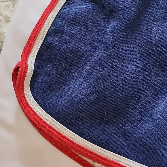 Sporty Navy Blue Women's Shorts with Red and White Stripe Trim - Picture 3 of 4